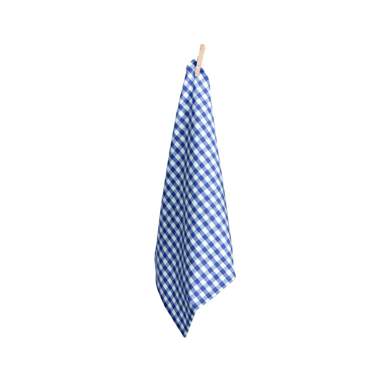 A blue and white gingham tea towel hanging on a clothesline, highlighting its classic design and suitability for various dining settings.