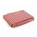 red and white gingham tablecloth, enhancing kitchen decor and providing durable protection for your table.