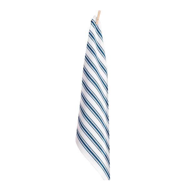 A chic navy striped scarf resting on a clean white surface, highlighting its sophisticated pattern and aesthetic appeal.