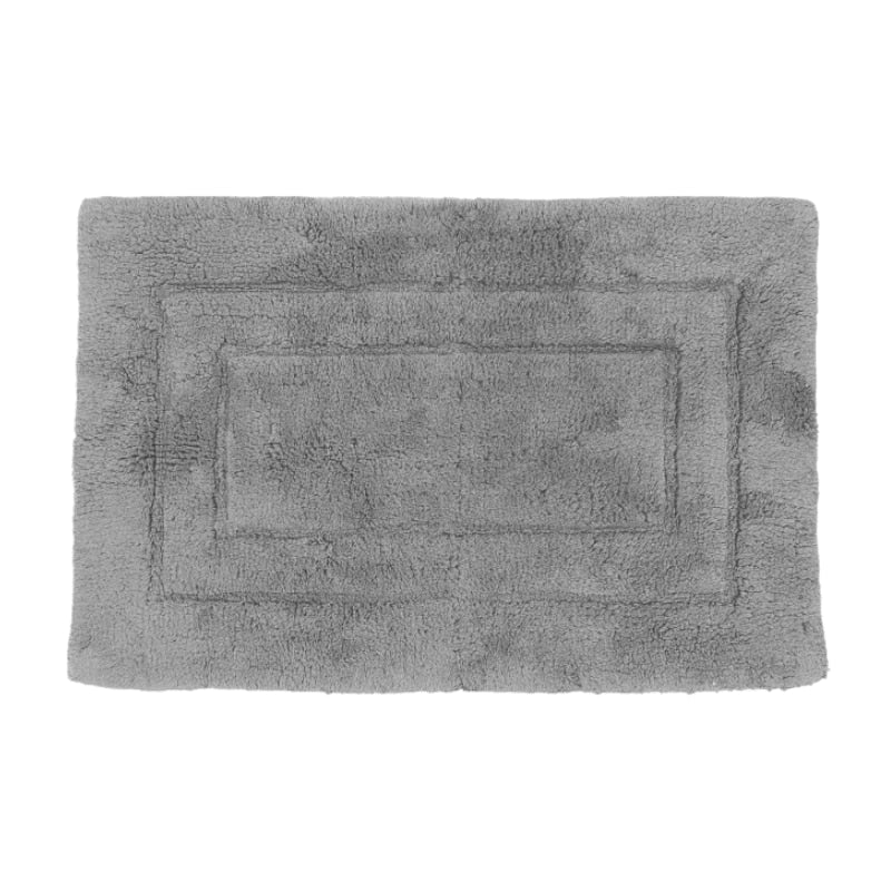 Soft grey bath mat on a white background, adding comfort and style to your bathroom decor. Perfect for chilly tiles!