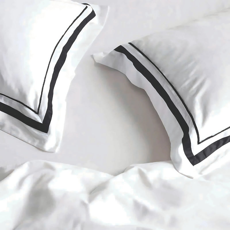 Zoom in details of a luxurious 1000 thread count Egyptian cotton European pillowcase, combining comfort, style, and eco-friendliness for a five-star experience.