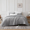 A cosy dove quilt cover set crafted from soft cotton and TENCEL™ Lyocell for ultimate comfort.