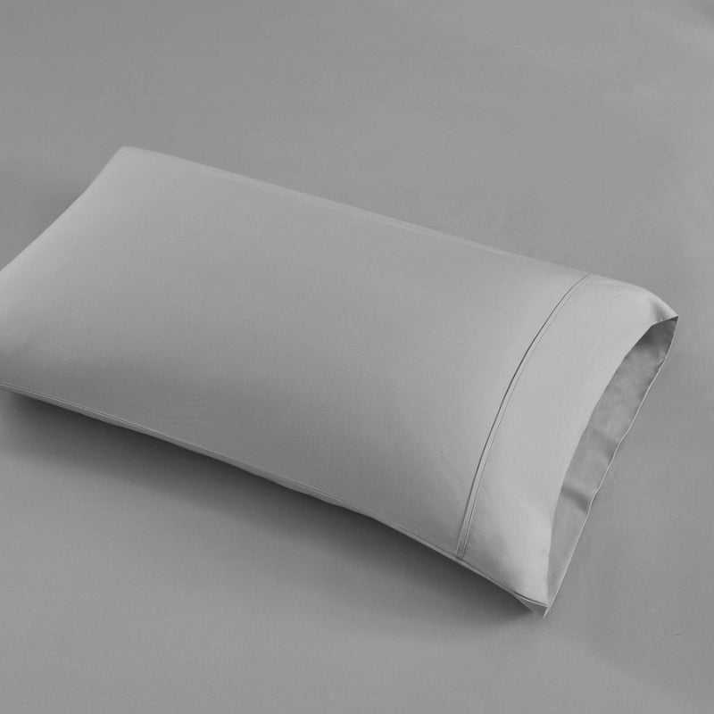 A pillow featuring the dove pillowcase crafted from soft cotton and TENCEL™ Lyocell for ultimate comfort.