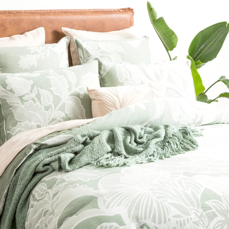 Elegant sage green european pillowcase with a soft floral design, ideal for creating a sophisticated atmosphere.