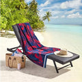 A beach chair adorned with a vibrant fresh catch beach towel, showcasing luxurious comfort and stylish design for relaxation.