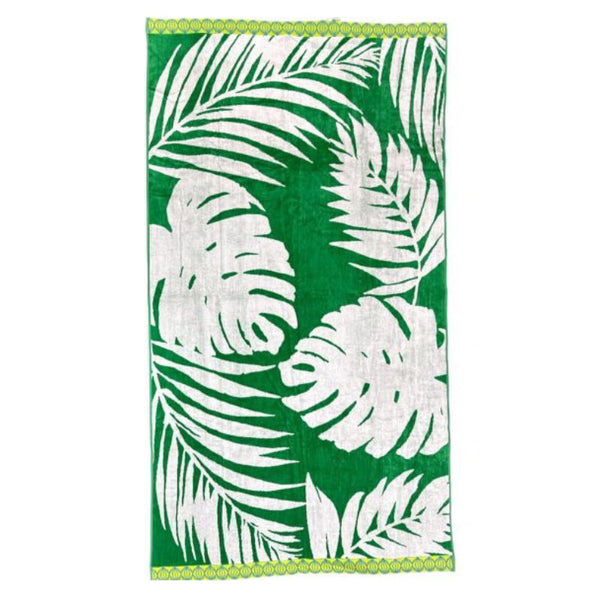 Colourful tropical green beach towel emphasizing its plush feel and stylish design for beach relaxation.