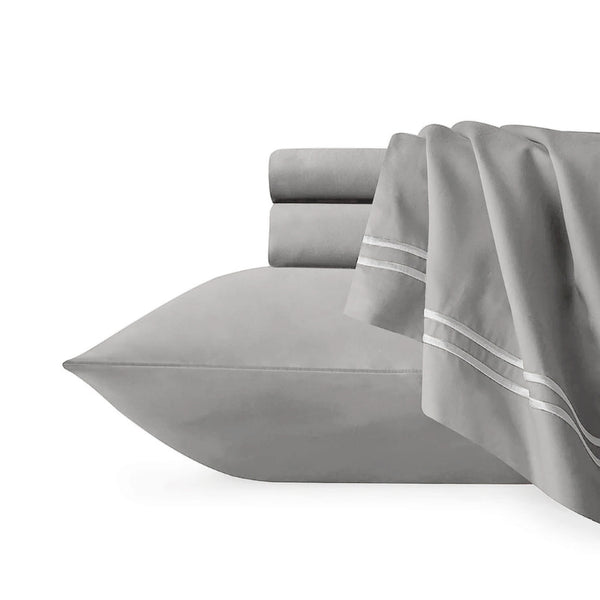 Elegant silver white sheet set featuring the pillowcases made from high-quality Egyptian cotton for a soft and durable sleep experience.