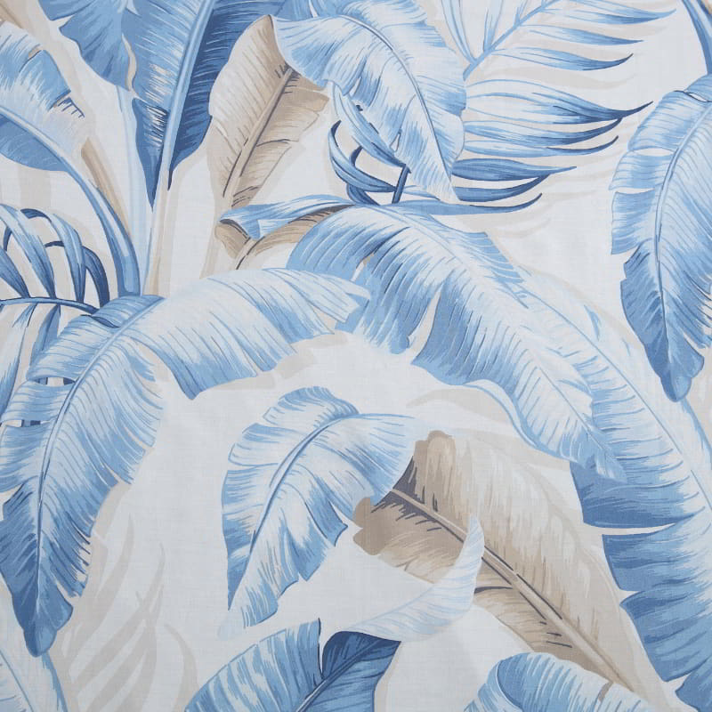 Tropical blue and white fabric with a big leaf design, bringing a relaxed island feel to your bedroom decour.