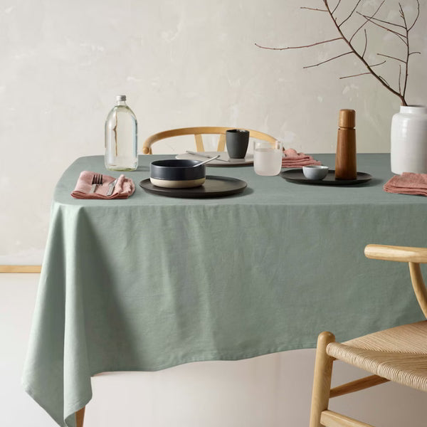 Charming green tablecloth made from linen cotton blend, showcasing a unique helm design, perfect for elevating your dining decor.