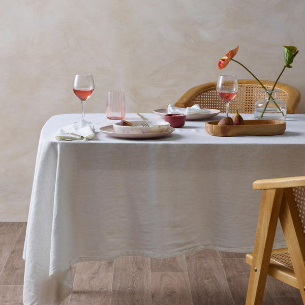 Charming white tablecloth made from linen cotton blend, showcasing a unique helm design, perfect for elevating your dining decor.