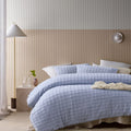 A powder blue quilt cover and pillowcases in a stylish and modern design add a touch of elegance to your bedroom.