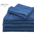 Luxurious navy towels stacked neatly, emphasizing softness and absorbency for a relaxing bath.