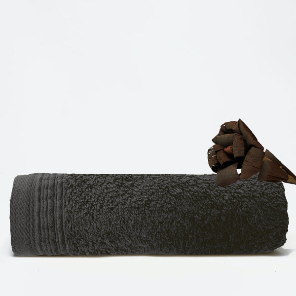 A charcoal face towel showcasing elegance with a wide sheared border for a luxurious touch.