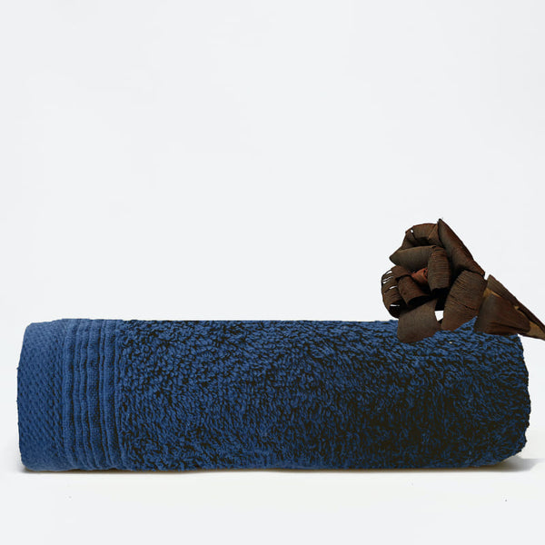 A navy face towel showcasing elegance with a wide sheared border for a luxurious touch.