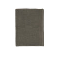 A soft silver bath mat enhancing the calm and luxurious feel of a spa-inspired bathroom.