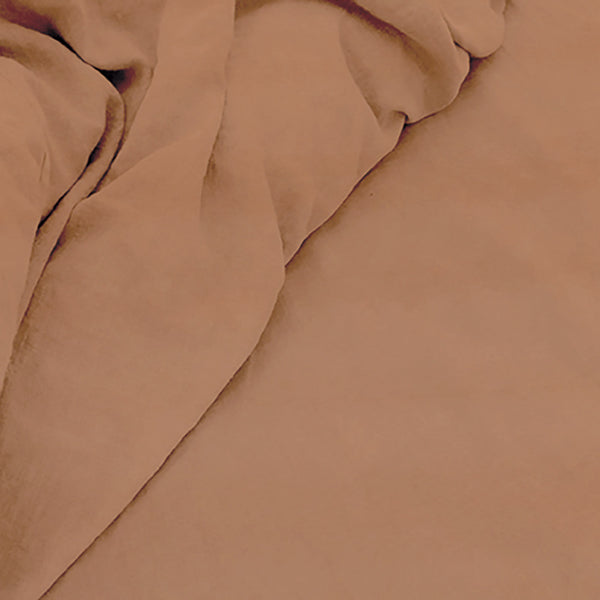 Experience luxury with Doux Pure Linen Terracotta Sheet Set, featuring soft, breathable linen for unmatched comfort and elegance.