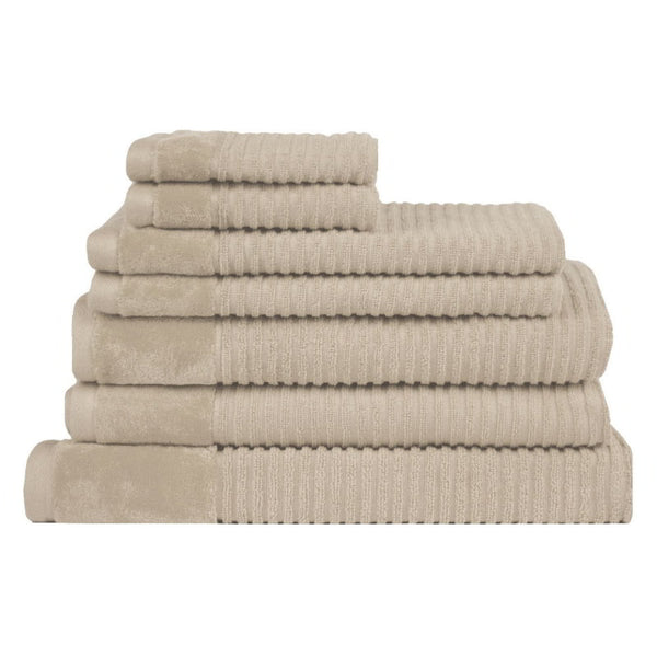 Neatly arranged plaster towels, crafted from premium cotton, offering elegance and comfort for a stylish bathroom experience.