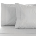 Luxurious 1000 thread count cotton-rich silver sheet set, offering comfort, durability, and seasonal versatility for a restful sleep experience.