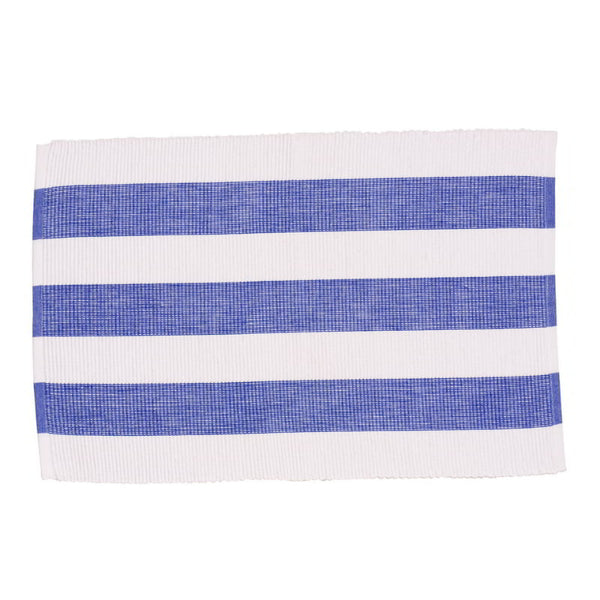 A cobalt blue placemat offering stylish protection for tables and a light, airy Mediterranean ambiance.