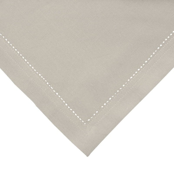 An oatmeal napkin adding sophistication and elegance to the overall table decor.