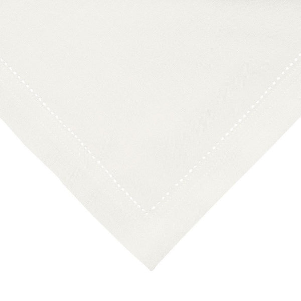 A white napkin adding sophistication and elegance to the overall table decor.