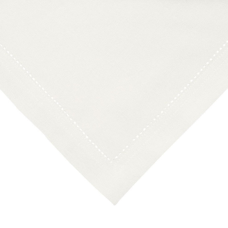 A white napkin adding sophistication and elegance to the overall table decor.