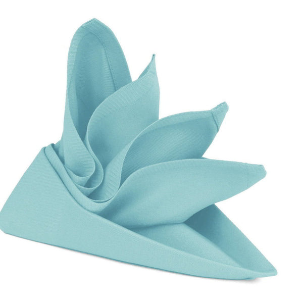 A beautifully folded lollipop island paradise blue napkin, crafted from premium cotton for a stylish dining experience.