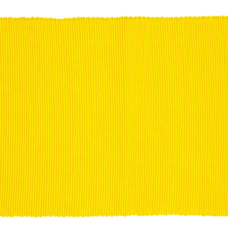 A sophisticated yellow ribbed placemat, enhancing dining experiences with style and protection.