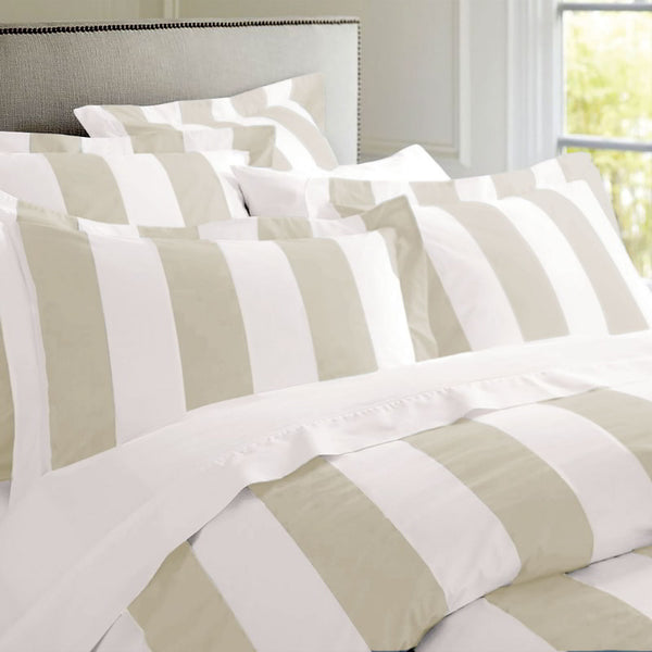 A taupe quilt cover set featuring faint stripes, offering comfort and elegance for a refined bedroom transformation.