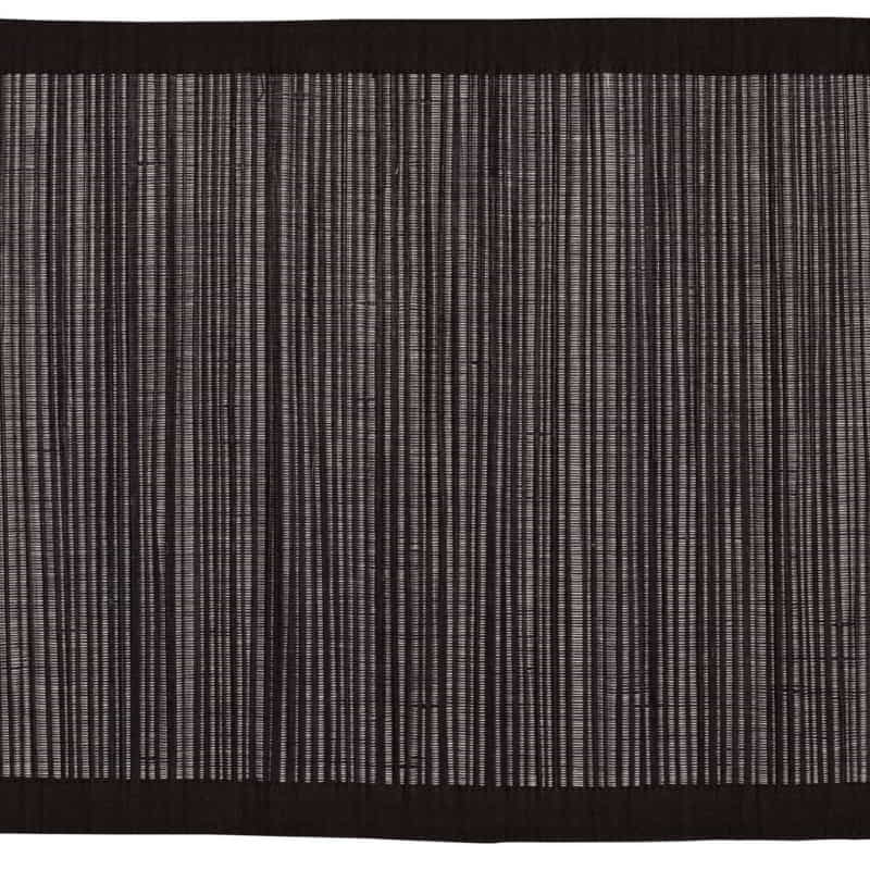 Striped black straw placemat, combining rustic charm with practicality, perfect for enhancing any dining experience.