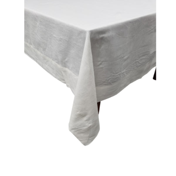 A white linen tablecloth enhancing mealtimes with elegance and comfort for any occasion.